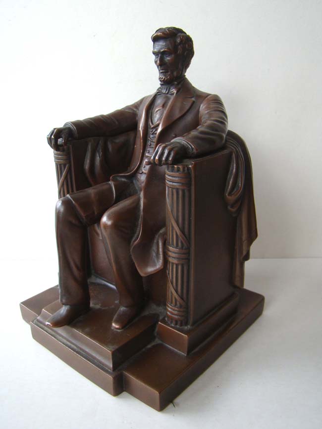 A fine pair of Jennings Brothers "Lincoln in the Chair" antique bookends circa 1925 — image 2